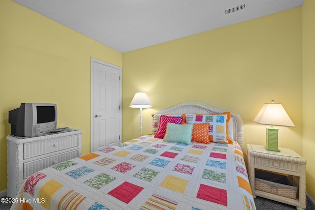 bedroom with visible vents