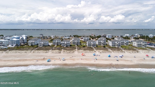 aerial view featuring a beach view and a water view