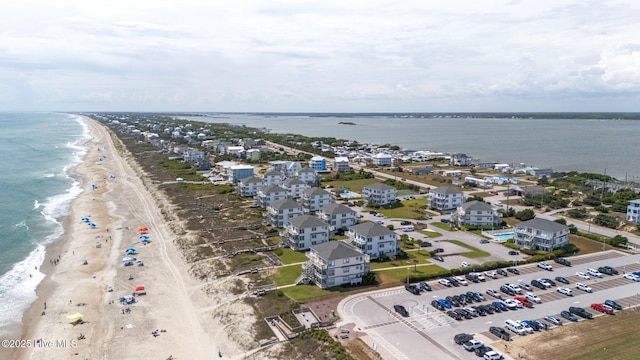 aerial view with a view of the beach and a water view