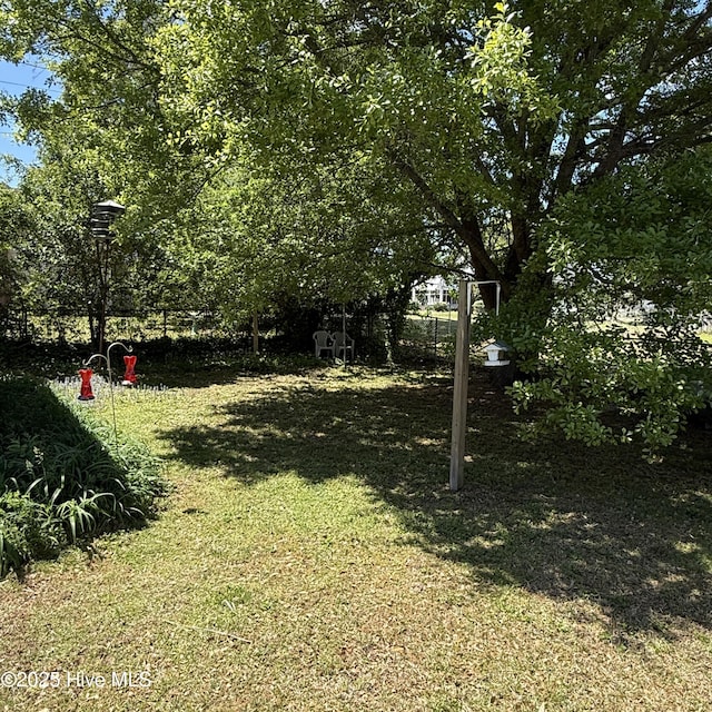 view of yard with fence