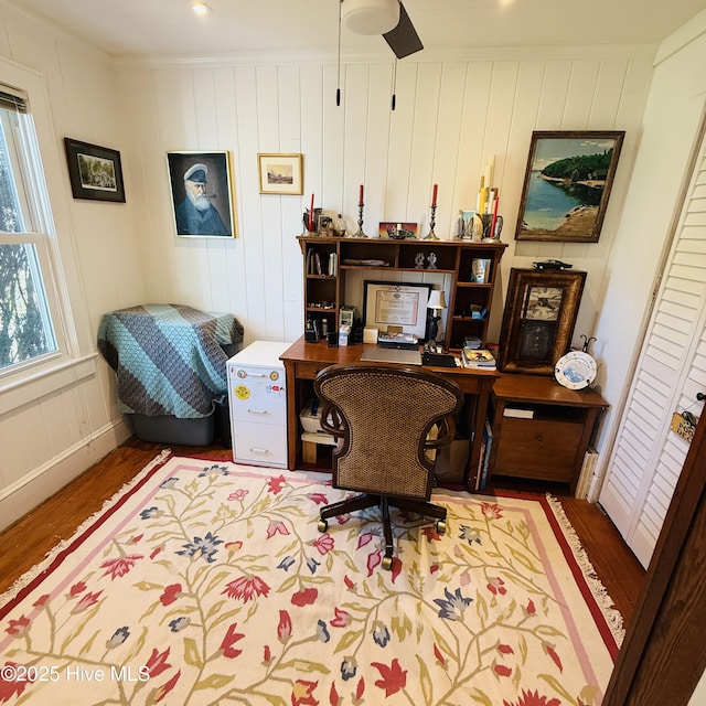 home office with ornamental molding, wood finished floors, a wealth of natural light, and ceiling fan