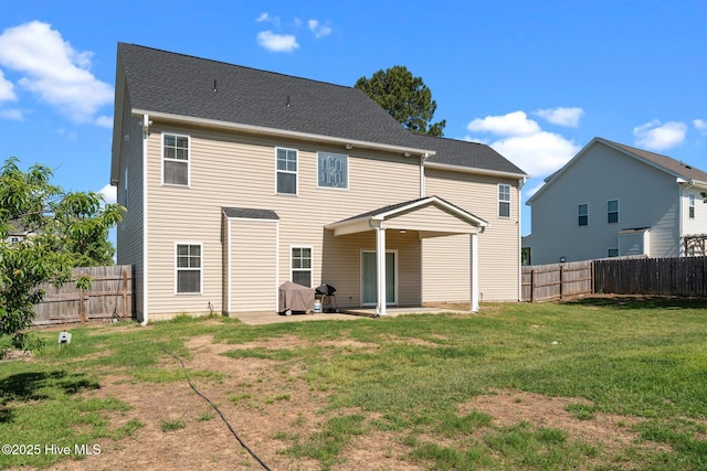 rear view of property with a patio area