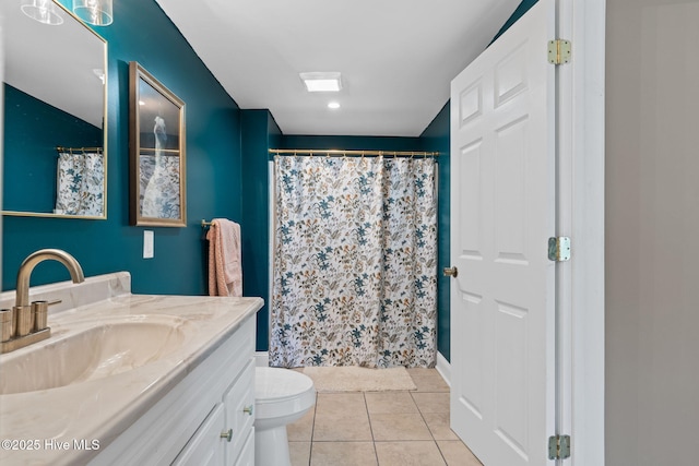 bathroom featuring toilet, tile patterned flooring, vanity, and a shower with shower curtain