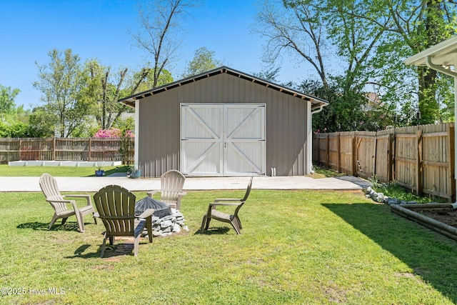 view of shed featuring a fenced backyard