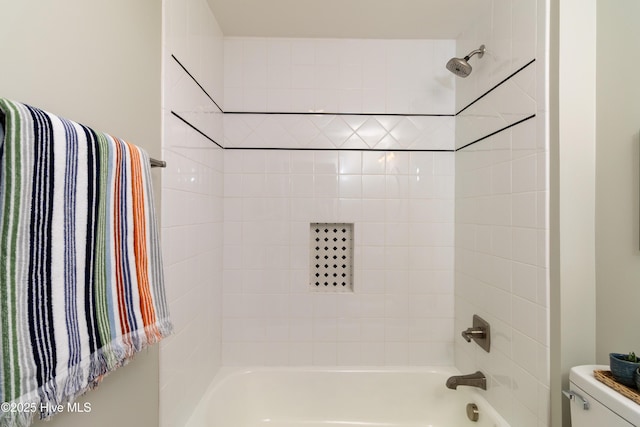 full bathroom featuring toilet and shower / washtub combination