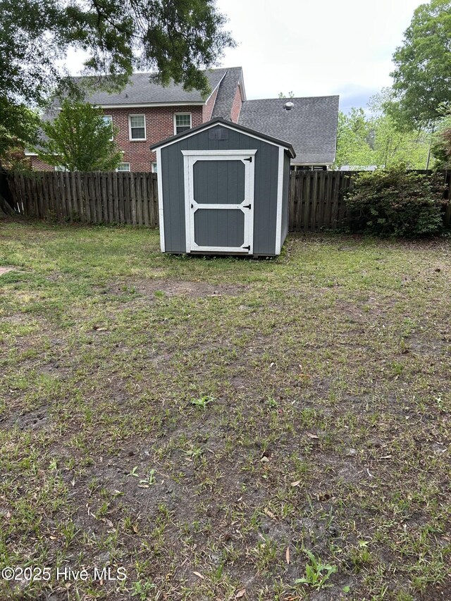 207 E Ashe St, Burgaw, NC 28425 - view of shed featuring a fenced backyard