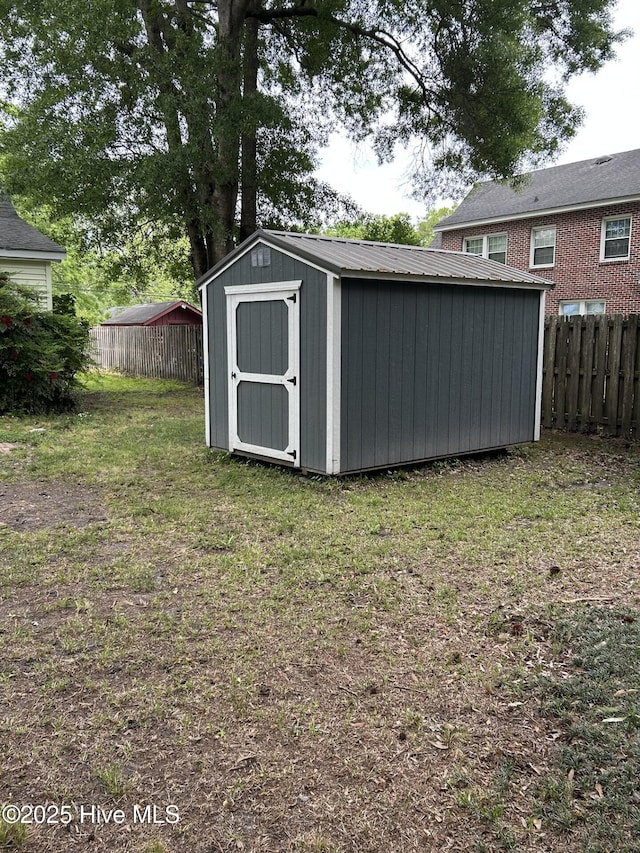 207 E Ashe St, Burgaw, NC 28425 - view of shed with a fenced backyard