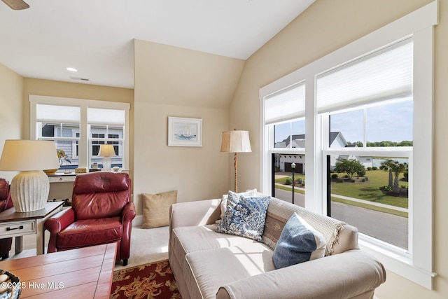 living room with plenty of natural light and recessed lighting