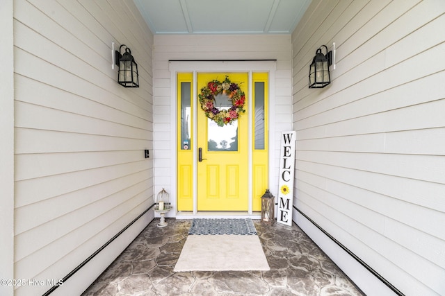 property entrance with baseboard heating