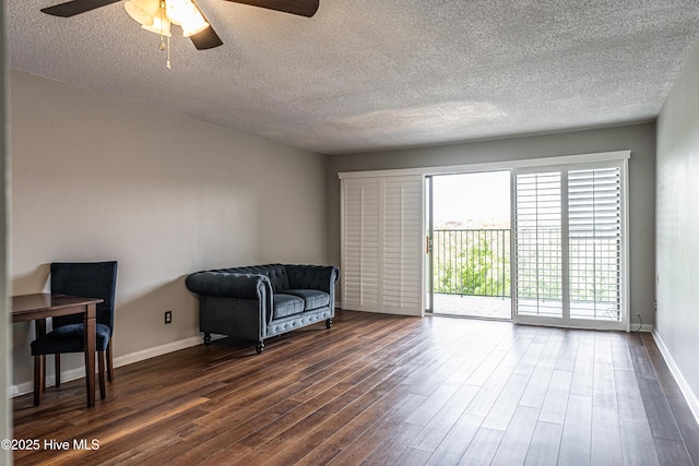 1100 Clarendon St Unit 606, Fayetteville, NC 28305 - unfurnished room featuring a ceiling fan, a textured ceiling, dark wood finished floors, and baseboards