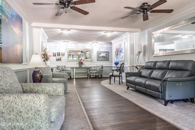 1100 Clarendon St Unit 606, Fayetteville, NC 28305 - living area featuring a ceiling fan, ornamental molding, wood finished floors, and a textured ceiling