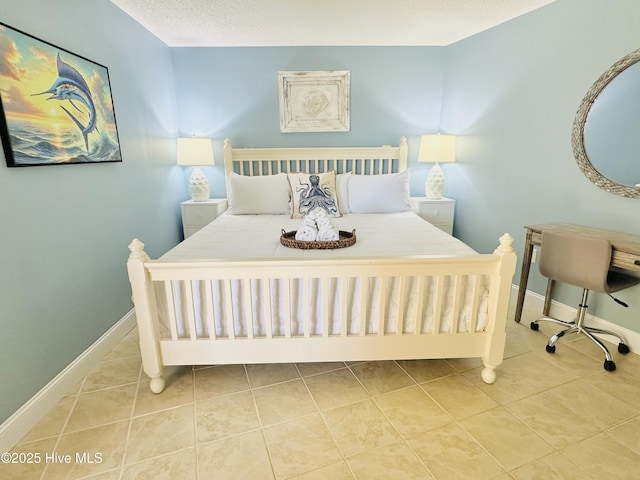 tiled bedroom with baseboards