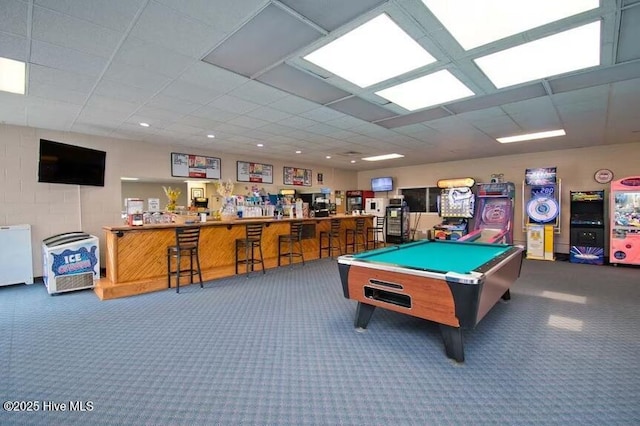 rec room with a drop ceiling, pool table, and carpet floors