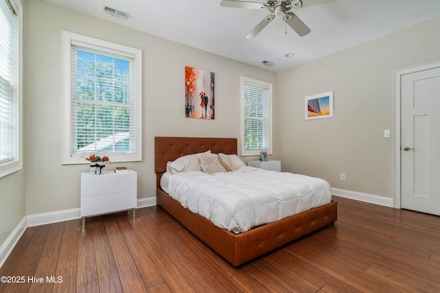 61 Spinnaker Point Rd N, Oriental, NC 28571 - bedroom with wood-type flooring, baseboards, and ceiling fan