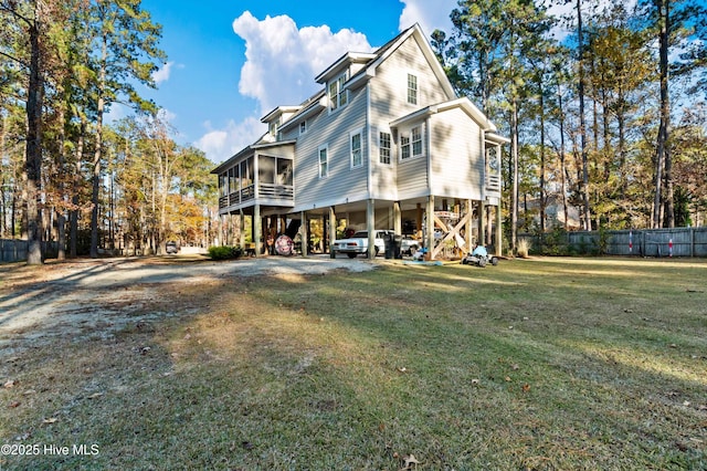 61 Spinnaker Point Rd N, Oriental, NC 28571 - back of house with a sunroom and a carport