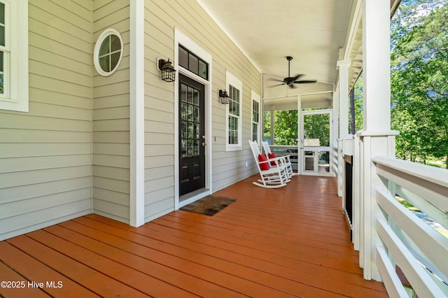 61 Spinnaker Point Rd N, Oriental, NC 28571 - deck featuring a porch and a ceiling fan