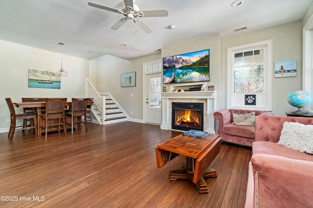 61 Spinnaker Point Rd N, Oriental, NC 28571 - living area with stairs, a ceiling fan, wood finished floors, recessed lighting, and a glass covered fireplace