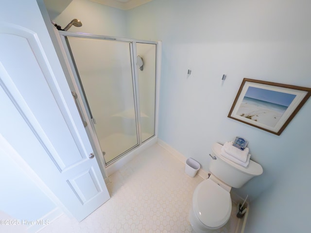 109 Island Quay Ct, Atlantic Beach, NC 28512 - bathroom featuring a shower stall, toilet, and baseboards