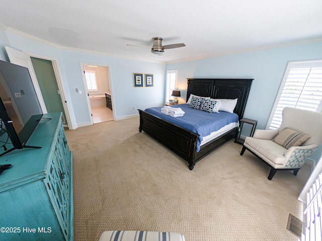 bedroom featuring light colored carpet, crown molding, baseboards, and ceiling fan