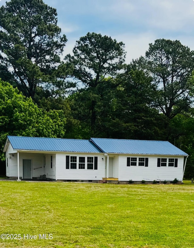 190 NC Highway 32, Sunbury, NC 27979 - single story home with a front yard, metal roof, and crawl space