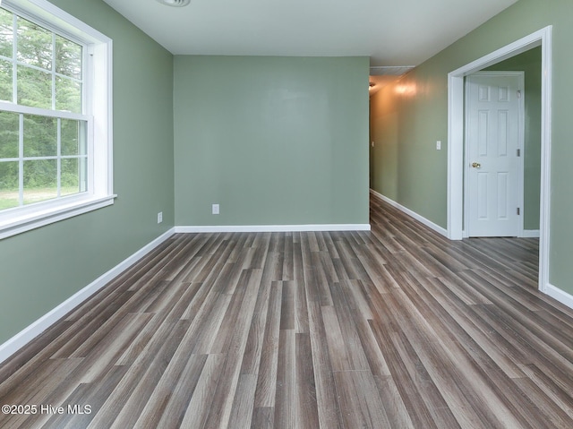 190 NC Highway 32, Sunbury, NC 27979 - empty room with wood finished floors, healthy amount of natural light, and baseboards