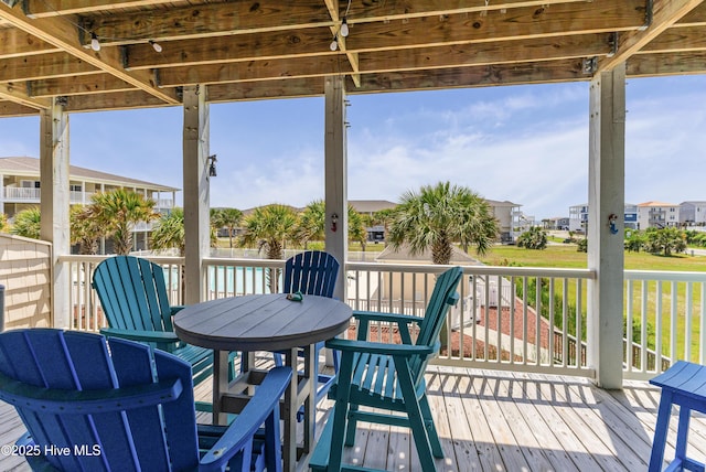 120 SE 58th St Unit 2104, Oak Island, NC 28465 - wooden terrace with a residential view
