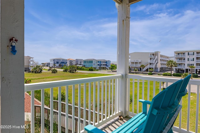 120 SE 58th St Unit 2104, Oak Island, NC 28465 - balcony with a residential view