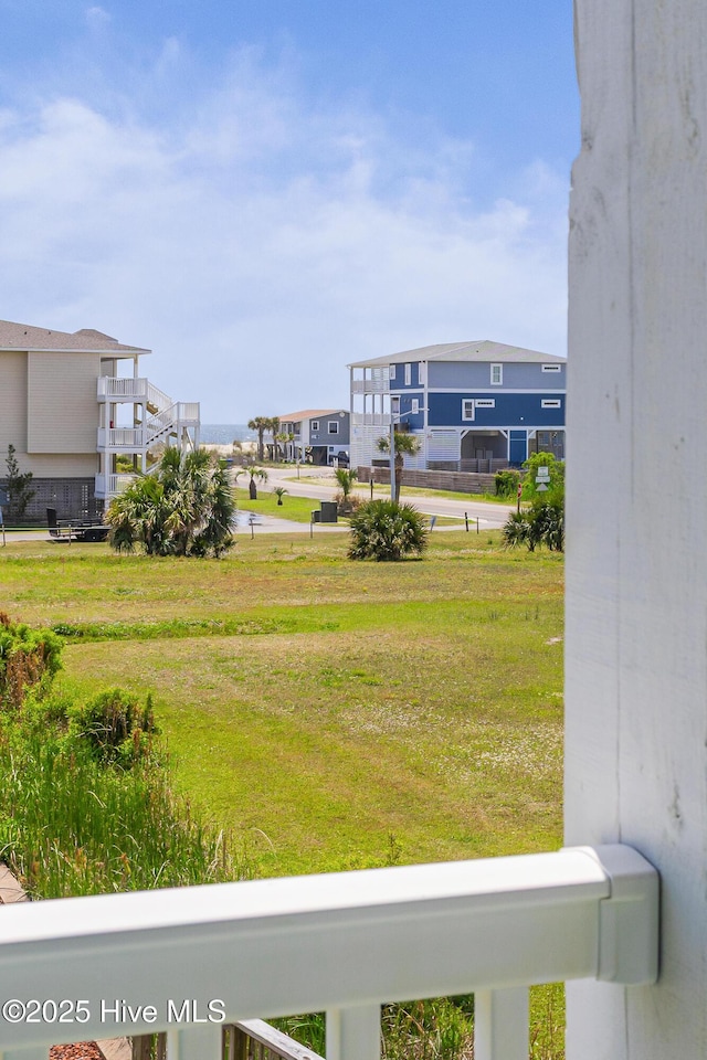 120 SE 58th St Unit 2104, Oak Island, NC 28465 - view of yard with a residential view