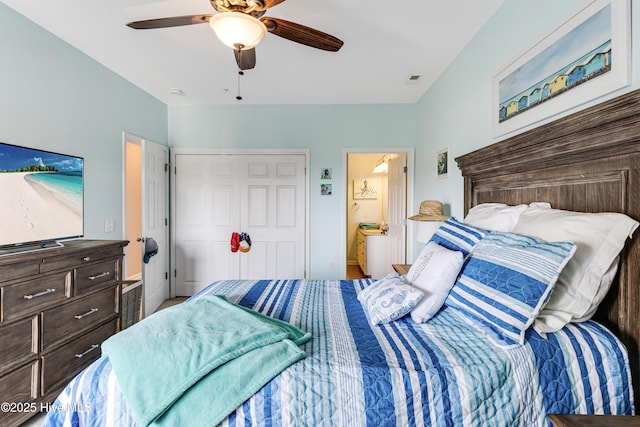 120 SE 58th St Unit 2104, Oak Island, NC 28465 - bedroom with a ceiling fan, ensuite bath, visible vents, and a closet