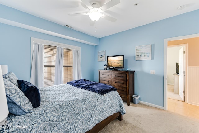 120 SE 58th St Unit 2104, Oak Island, NC 28465 - carpeted bedroom with visible vents, a ceiling fan, and baseboards