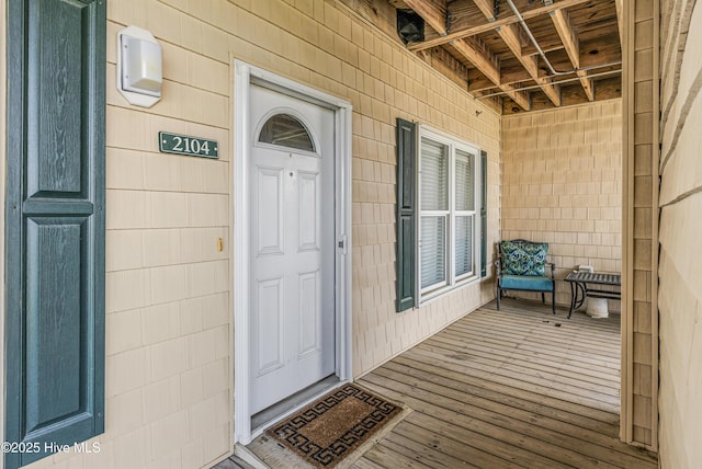120 SE 58th St Unit 2104, Oak Island, NC 28465 - doorway to property featuring a porch