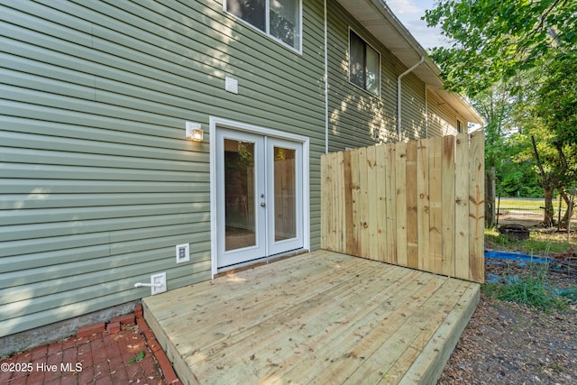 wooden terrace featuring french doors