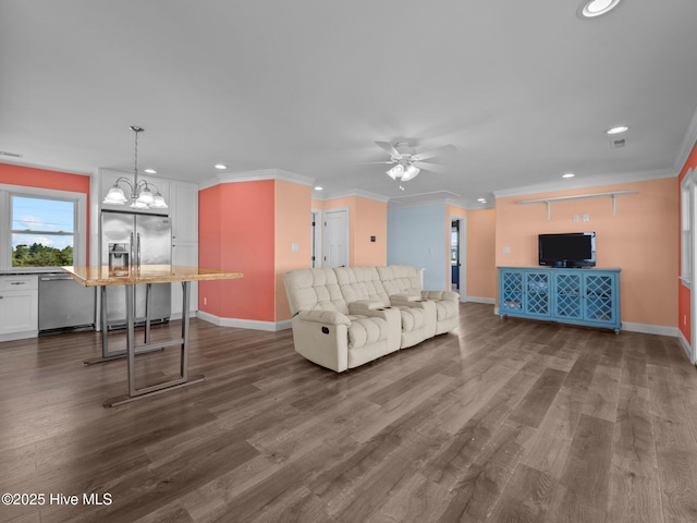 living room with baseboards, recessed lighting, and dark wood-style flooring