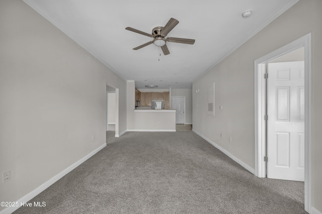 2807 Bloomfield Ln Unit 307, Wilmington, NC 28412 - unfurnished living room with baseboards, ceiling fan, and carpet