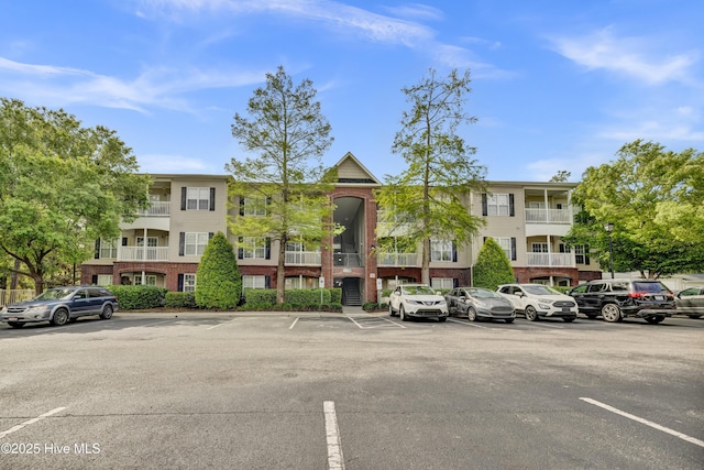 2833 Bloomfield Ln Unit 103, Wilmington, NC 28412 - view of property with uncovered parking