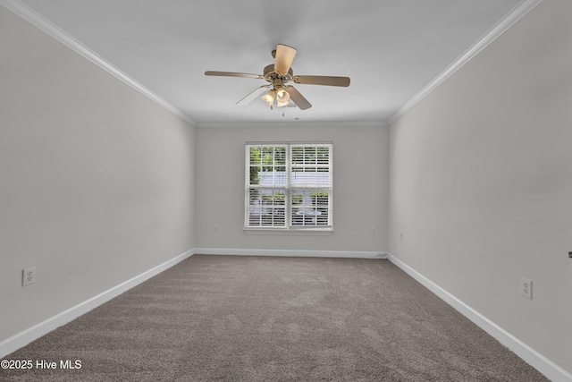 unfurnished room with ceiling fan, ornamental molding, baseboards, and carpet