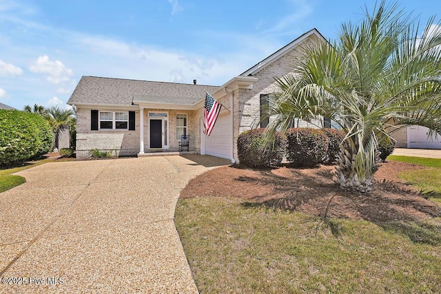 1008 Garden Club Way, Leland, NC 28451 - ranch-style home featuring driveway, a garage, and brick siding