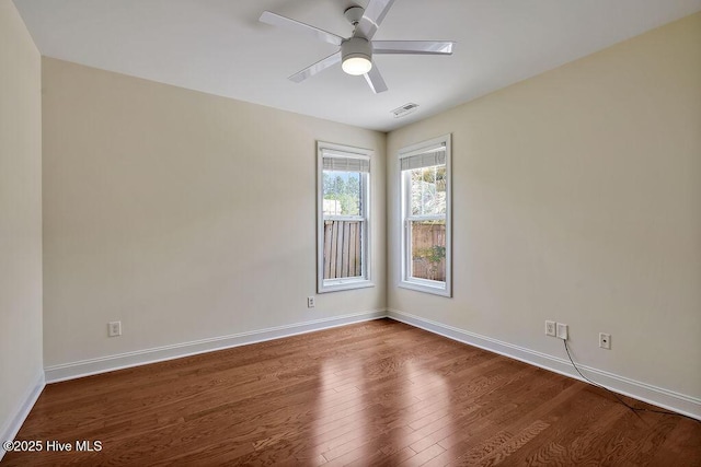 1008 Garden Club Way, Leland, NC 28451 - spare room featuring wood finished floors, baseboards, and a ceiling fan