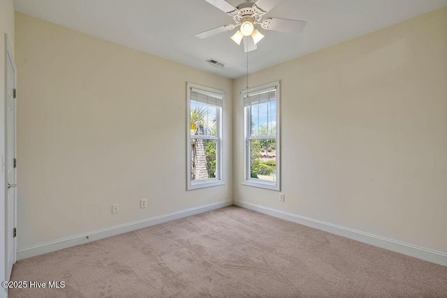 1008 Garden Club Way, Leland, NC 28451 - empty room featuring baseboards, carpet flooring, and ceiling fan