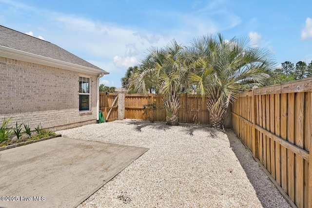 1008 Garden Club Way, Leland, NC 28451 - fenced backyard featuring a patio
