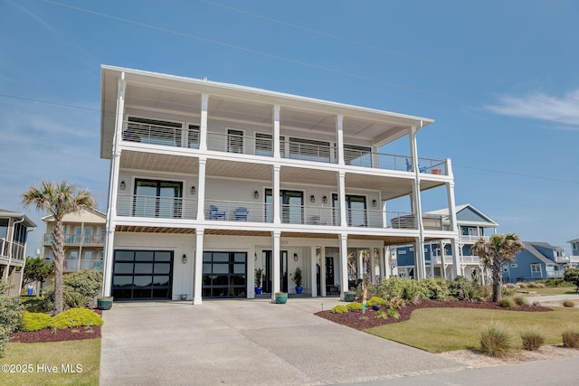 view of front facade featuring a garage and concrete driveway
