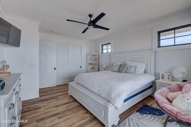 bedroom with ornamental molding, a ceiling fan, baseboards, and light wood-type flooring