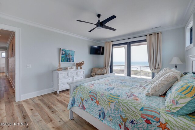 bedroom featuring ornamental molding, baseboards, and light wood-type flooring