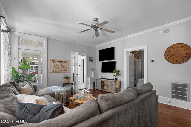 210 S 17th St, Wilmington, NC 28401 - living room with ceiling fan, crown molding, dark wood-style floors, and baseboards