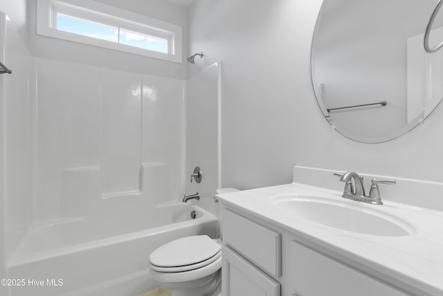 full bathroom featuring shower / bathtub combination, toilet, and vanity