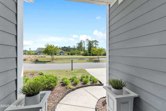 exterior space with a water view