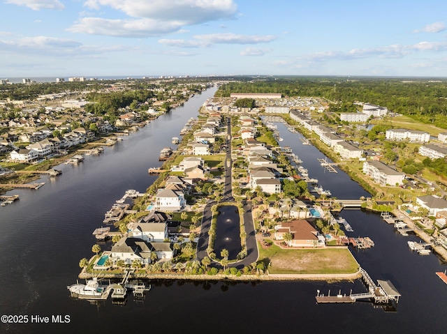 birds eye view of property with a residential view and a water view