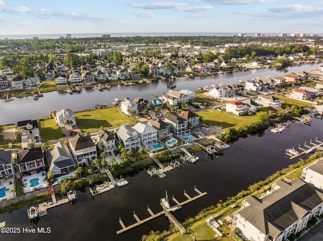 aerial view featuring a water view and a residential view