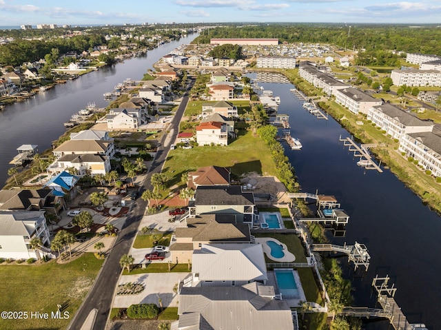 aerial view with a residential view and a water view