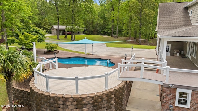 pool featuring a patio